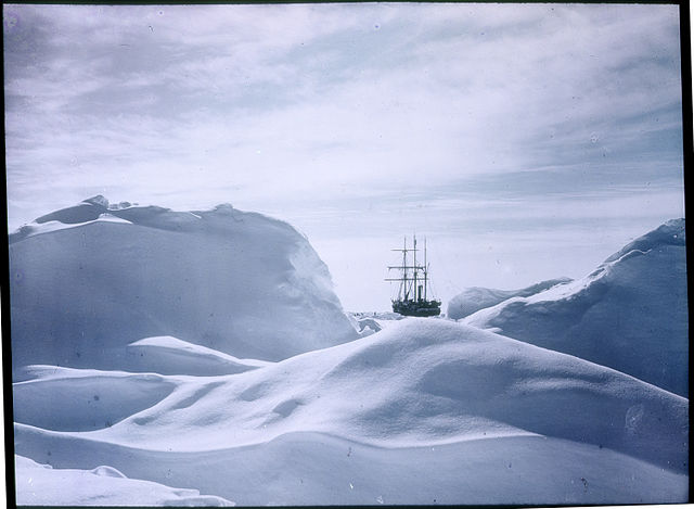 Photograph showing glimpse, between the snow, of the ship "Endurance", the Shackleton Expedition.
